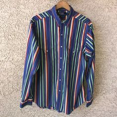 Men's Polo Ralph Lauren Snap Shirt RL Western Cotton Navy Multi Color Stripe L. Condition is Pre-owned. Shipped with USPS First Class Package. Classic Multicolor Long Sleeve Tops, Ralph Lauren Striped Shirt For Spring, Ralph Lauren Striped Collared Tops, Ralph Lauren Multicolor Casual Tops, Ralph Lauren Multicolor Spring Shirt, Ralph Lauren Long Sleeve Summer Tops, Casual Multicolor Ralph Lauren Tops, Ralph Lauren Striped Long Sleeve Tops, Ralph Lauren Fitted Striped Shirt