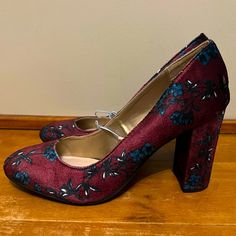 Absolutely Gorgeous Chunky Heel Pumps In A Burgundy/Wine Shade With Blue Floral Designs. Round Toe. No Longer Have The Original Box. Only Worn To Try On. Measurements: The Inside Of The Heel To The Bottom Is 3”, And From The Outside Of The Heel To The Bottom Is 3.5”. Fabric High Heel Heels For Formal Occasions, Formal Fabric High Heel Shoes, Formal Fabric High Heels, Fabric Block Heel Shoes For Formal Occasions, Formal Fabric Block Heel Shoes, Fabric High Heels For Fall, Burgundy Closed Toe Synthetic Heels, Fabric Heels With Round Toe For Fall, Fall Round Toe Fabric Heels