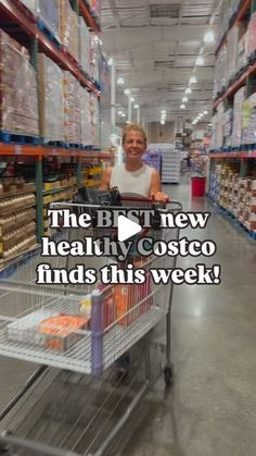 a woman pushing a shopping cart in a grocery store with the caption, the best new healthy costco finds this week