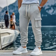 Season:Spring   Fall,Winter; Fabric:Polyester; Gender:Men's; Style:Sports,Fashion; Occasion:Daily,Casual,Outdoor; Fit Type:Regular Fit; Function:Warm,Comfort; Waistline:Mid Waist; Pattern:Plain; Design:Multi Pocket,Elastic Waist,Drawstring; Pants Type:Joggers,Sweatpants,Trousers,Fleece Pants,Cargo Sweatpants; Fly Type:Drawstring,Elasticity; Front page:FF; Listing Date:09/12/2024; Hips:null; Length:null; Waist:null; Pants Length:Full Length Joggers For Men, Cargo Sweatpants, Womens Basic Tops, Printed Shirts Men, Suits Prom, Style Sweatpants, Style Sportif, Linen Shirt Men, Pants Cargo