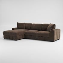 a brown sectional couch sitting on top of a white floor