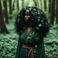 a woman with black hair and green dress standing in the woods wearing leaves on her head