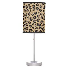 a lamp with a leopard print shade on it