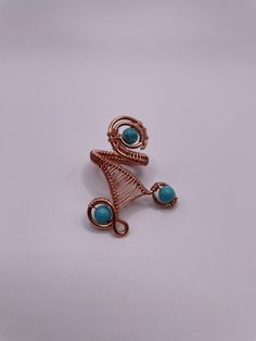 The best thing about rings that don't close? Being able to customize the ring to the size of your finger!  Because it is more customizable, you may have to move the wire around a little to adjust it. Turquoise Metal Rings As A Gift, Turquoise Metal Rings For Gifts, Turquoise Rings Suitable As Gifts, Turquoise Metal Rings For Gift, Unique Handmade Adjustable Turquoise Ring, Handmade Adjustable Open Turquoise Ring, Handmade Adjustable Turquoise Open Ring, Turquoise Beaded Rings As A Gift, Turquoise Beaded Rings As Gifts