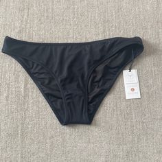 Shore & Shade Black Bikini Bottoms Size Medium Nwt. Black Swimwear Briefs For Sunbathing, Fitted Black Seamless Swimwear, Black Brief Tankini For Poolside, Black Tankini For Poolside, Fitted Black Bottoms For Beach Season, Black Fitted Bottoms For Beach Season, Black Stretch Brief Swimwear, Black Seamless Bottoms For Beach Season, Black Swimwear Brief With Lined Body