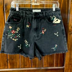 Super Cute Embroidered Black Jean Shorts. Ladies Size 9/28 $30 Casual Black Embroidered Bottoms, Black Embroidered Cotton Bottoms, Black Embroidered Cotton Shorts, Embroidered High Rise Cotton Bottoms, Embroidered High-rise Cotton Bottoms, High Rise Embroidered Cotton Bottoms, Casual Bottoms With Floral Embroidery In Short Length, Black Bottoms With Floral Embroidery For Summer, Trendy High Waist Floral Embroidered Shorts