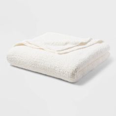 two white towels folded on top of each other