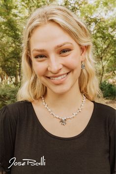 Two waves create this beautiful fleur de lis on a white keshi pearl necklace, representing the most iconic symbol of New Orleans. · Sterling silver · Freshwater keshi pearls · 18" length · Water lily 1"L x 7/8"W · Handcrafted toggle clasp · Made in New Orleans · 1 year warranty · Complimentary gift packaging · Free shipping · Free catalog · Free postcard designed by Jose · Free biography card about Jose Keshi Pearl Necklace