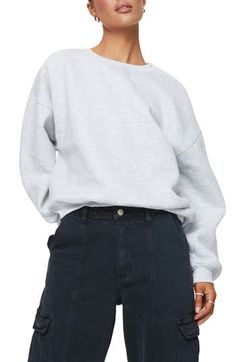 This cozy cotton-kissed sweatshirt is designed in a slouchy silhouette with dropped shoulders. Crewneck Dropped shoulders Ribbed cuffs and hem 65% polyester, 35% cotton Machine wash, dry flat Imported Casual Sweatshirt With Ribbed Cuffs And Drop Shoulder, Basic Spring Sweatshirt With Ribbed Cuffs, Casual Boxy Sweater With Ribbed Cuffs, Trendy Relaxed Fit Sweatshirt With Ribbed Neckline, Trendy Sweatshirt With Ribbed Neckline And Relaxed Fit, Casual Boxy Fit Sweats With Drop Shoulder, Casual Boxy Sweats With Drop Shoulder, Casual Sweater With Ribbed Cuffs And Boxy Fit, Casual Boxy Crew Sweatshirt