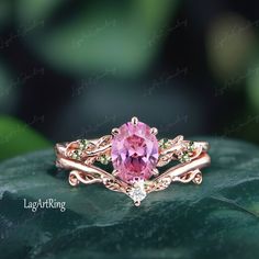 Oval cut Pink Sapphire Engagement ring Rose Gold Promise Ring Leaf Nature Inspired Bridal Ring Sep Birthstone Gemstone Ring  Jewelry gifts Ring Details: - Theme:Romantic Wedding & Engagement - comfortable band - Stone:6*8mm lab created pink sapphire Side stones: Peridot - Total weight: 0.07 ctw (High Quality) - ring band width :1.5mm - ring thicknesses:1.2mm Wedding Band:0.035ctw Stones: lab created moissanite - ring band width :1.3mm - ring thicknesses:1.3mm - Metal choose:10k or 14k or 18k ros Pink Sapphire Engagement Ring Rose Gold, Sapphire Engagement Ring Rose Gold, 3mm Ring, Pink Sapphire Engagement Ring, Sapphire Side Stones, Rose Gold Promise Ring, Gold Promise Ring, Pink Sapphire Ring Engagement, Future Engagement Rings