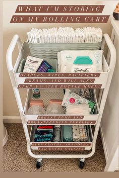 a white cart filled with lots of diapers and other items on top of a carpeted floor