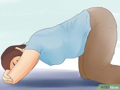 a man is doing push ups on the ground with his hands behind his head and feet