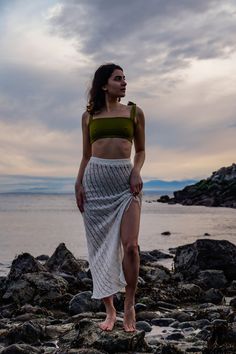 Elevate your beachside allure with our Hollow Knitted Skirt, a mesmerizing addition to your vacation wardrobe. This Vacation Split Thigh Maxi Beach Skirt effortlessly combines comfort and style, featuring intricate knitted details that add a touch of boho chic to your look. Crafted with care and designed for the free-spirited woman, it's the perfect piece of Women's Clothing to showcase your individuality. Size: Crafted from a sensitive material, please handle with care. Designed as one size fits most, suitable for XS, S, and medium sizes.  Care Instruction: Gentle care is key for this exquisite piece - hand wash only. Please refrain from using bleach or tumble-drying to preserve its delicate beauty and ensure lasting enjoyment. Refund/Exchange I do not accept returns but happily offer exc White Crochet Lace Swimwear For Beach, White Summer Skirt For Beach Party, White Bohemian Skirt For Beach Party, White Crochet Beach Cover-up, White Crochet Lace Beachwear Cover-up, White Crochet Lace Beach Cover-up, White Crochet Top For Poolside Summer Style, White Crochet Top For Poolside Summer Wear, White Summer Crochet Top For Poolside