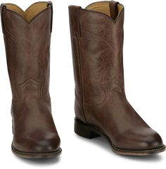 This 10-inch classic Roper boot offers a traditional design with a timeless appeal. Crafted with high-quality leather, it features a rounded toe and a 1-inch heel, providing comfort and durability. The boot's simple yet elegant construction makes it versa Classic Moto Boots With Moc Toe For Western-themed Events, Classic Moc Toe Moto Boots For Western-themed Events, Classic Waterproof Boots With Snip Toe And Rubber Sole, Classic Work Boots With Reinforced Plain Toe, Classic Mid-calf Boots With Leather Lining, Classic Moto Boots With Leather Lining And Snip Toe, Classic Waterproof Boots With Reinforced Snip Toe, Classic Waterproof Boots With Reinforced Heel And Snip Toe, Classic Plain Toe Work Boots For Western-themed Events