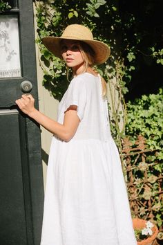 Charlotte Linen Dress - White Linen Dress - MERRITT CHARLES White Breezy Dresses With Relaxed Fit, White Breezy Dress With Relaxed Fit, Casual Oversized White Linen Dress, Oversized White Linen Casual Dress, Flowy White Linen Dress For Spring, White Flowy Linen Dress For Spring, White Linen Dress With Short Sleeves For Day Out, White Linen Dress For Day Out, White Oversized Linen Beach Dress