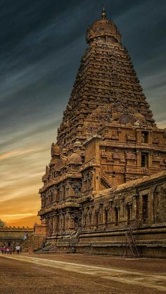 an ancient temple with many pillars and towers