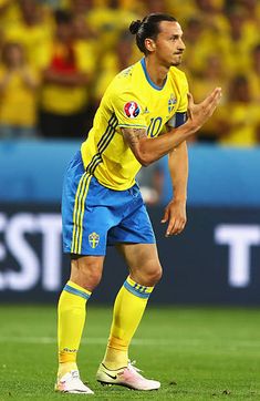 the soccer player is ready to kick the ball in his team's match against brazil