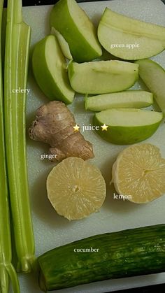 there are many different fruits and vegetables on the cutting board