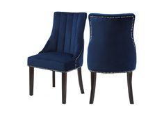 a pair of blue velvet chairs with studded trimmings on the back and sides