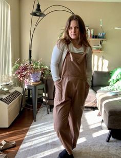 "I love some good overalls, even more, that they are linen! Made to be extra comfy with an oversize fit but still has some flattering snitches at the waist - great for adding layers underneath for the winter. The linen makes it a perfect transition from winter to spring and summer with the lightweight material. Condition: Good condition, no noticeable issues. Measurements are taken with items lying flat on the ground. Please review the measurements closely!   - Waist: 36 - 40in. - In-seam (crotc Cotton Overalls With Side Pockets For Loungewear, Fall Cotton Overalls For Loungewear, Fall Overalls With Pockets For Loungewear, Fall Loungewear Overalls With Pockets, Casual Everyday Overalls For Fall, Casual Everyday Fall Overalls, Casual Linen Bib Front Overalls, Utility Overalls With Relaxed Fit For Everyday, Brown Utility Overalls For Fall