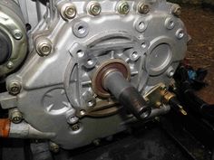 an engine is shown in this close up photo, with the oil pump attached to it