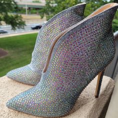 Iridescent Rhinestone Silver High Heel Ankle Boots, Size 7.5 M, Nib. Fabulous Boots Are Silvery Pewter Textured Metallic Fabric Covered With Iridescent Aurora Borealis Faux Crystal Rhinestones. Slip On Style Boots Have Raised Back And 4.5 Inch Heels Made For That Dress Up Affair Or Fall Holidays Party. Never Worn. Need A Good Shoe Lovers Home! Silver Ankle-high Rhinestone Boots, Silver Rhinestone Ankle-high Boots, Silver Bedazzled Boots With Pointed Toe, Silver Bedazzled Pointed Toe Boots, Silver Bedazzled Heels With Round Toe, Silver Bedazzled Round Toe Heels, Square Toe Leather Boots, Silver High Heel, Roper Cowboy Boots