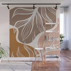 an abstract wall mural with leaves in brown, white and beige colors on a wooden floor