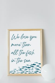 an art print with the words i love you more than all the fish in the sea