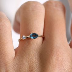 Dainty Oval Topaz Gemstone Ring, Dainty Oval Topaz Ring, Dainty Oval Topaz Birthstone Ring, Modern Oval Topaz Birthstone Ring, Layering Diamond Necklaces, Diamond Silver Ring, Topaz And Diamond Ring, Measure Ring Size, Blue Topaz Gemstone