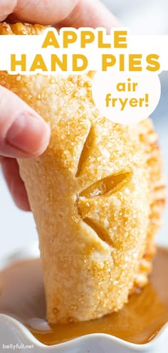 an apple hand pie is being held up to the camera with text overlay that reads, apple hand pies air fryer