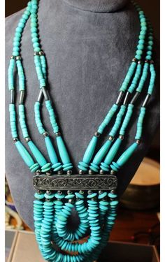 Wow! Everything was bigger and bolder in the early 90's right? Vintage Statement sized costume southwestern Native American cowboy turquois colored stone beaded necklace- super cool - dyed stone and maybe bone too beads and non silver Glammed up metal work too! Very over the top and fun southwestern glitzy! The memories of when I had my first agency there! And all my clothes were shiny! Loved it! 💝 Will tissue and ribbon to gift this bling nicely! 🎀 Southwestern Blue Necklace With Large Beads, Native American Cowboy, Southwestern Multi-strand Turquoise Necklace, Southwestern Style Hand-strung Blue Beaded Necklaces, American Cowboy, Glen Cove, Southwestern Silver Turquoise Multi-stone Necklace, Angel Wings Tattoo, Nickel-free Southwestern Blue Turquoise Necklace