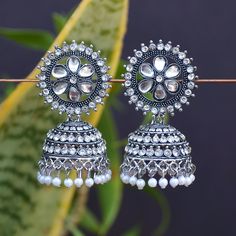 Perfect with ethnic & traditional wear. Fancy Party Wear Traditional Jhumki Earrings. Perfect gift for any occasion for yourself and your dear ones. It is advisable to store jewellery in a zip lock pouch (air tight pouch), keep away from water perfume and other chemicals and clean it with dry and soft cloth. Wedding Chandelier Earrings With Oxidized Finish, Oxidized Finish Dangle Earrings For Wedding, Wedding Chandbali Danglers With Oxidized Finish, Oxidized Finish Chandbalis For Wedding, Heavy White Fusion Style Jhumkas, Festive Oxidized Finish Chandelier Earrings For Wedding, Heavy Metal Earrings For Ceremonial Occasions, White Round Tilla Danglers, White Tilla Danglers