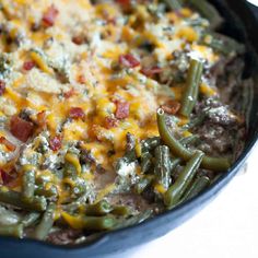 a casserole dish with green beans and cheese