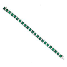 Retro inspired handcrafted platinum 950 bracelet. Zambian Emerald cut emeralds 14.9 ct stones from Zambia. Accented with white round diamonds 3.39 ct. Diamonds are natural in G-H Color Clarity VS. Width: 0.5 cm Height: 17.7 cm Weight: 33.3 g [shortcode] [video] [/video] [/shortcode] Platinum Bracelet, Platinum Earrings, Zambian Emerald, White Gold Bracelet, Colombian Emeralds, 18k Gold Jewelry, Zambia, Emerald Cut, Retro Inspired