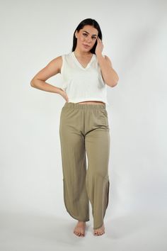 The chicest pair of lounge pants around! Our Casey lounge pants take your loungewear to the next level. Soft, comfortable, and so easy to style - everyone needs a pair of these. Features: Curve Hem Elastic Waist Model is wearing a medium. Height 5'8", Bust 35", Waist 28.5", Hip 34.5" Fabric content: 45% Nylon : 55% Rayon Versatile Wide Leg Pull-on Pants For Loungewear, Comfortable Stretch Harem Pants For Loungewear, Versatile Yoga Pants For Spring Loungewear, Spring Yoga Pants For Loungewear, Ankle-length Pull-on Pants For Loungewear, Ankle-length Yoga Pants For Summer Loungewear, Summer Ankle-length Yoga Pants For Loungewear, Relaxed Fit Harem Pants For Loungewear, Athleisure Harem Pants For Loungewear With Relaxed Fit