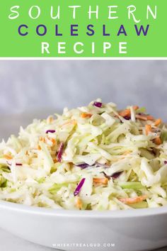 a white bowl filled with coleslaw and carrots on top of a table