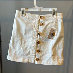 White Free People Mini Skirt With Buttons Up The Front. Stretch Denim Like Material. New With Tags Never Worn White Mini Skirt With Button Closure For Summer, White Mini Skirt With Button Closure For Spring, White Casual Mini Skirt With Buttons, Casual White Mini Skirt With Button Closure, Casual White Denim Skirt For Day Out, Skirt With Buttons, Free People Skirt, Stretch Denim, Mini Skirt