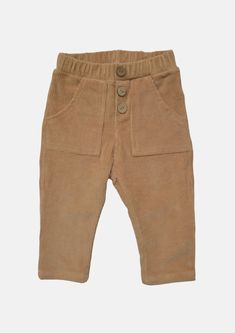 * Pants made from 100% cotton corduroy * 2 front pocket and a back pocket with label appliqué * Elastic waistband * 3 front coconut buttons * Color: Brown. 100% cotton, OEKO-TEX certified fabric. Baby Registry Essentials, Kids Corduroy, Corduroy Pant, Tiny Clothes, Summer Style Guide, Brown Corduroy, Clothing Essentials, Back Pocket, Corduroy Pants