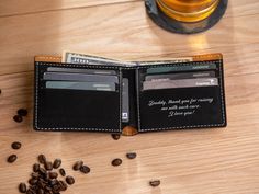 You'll love our engraved men's wallets! Each of our custom wallets is custom laser engraved to your specifications with initials, names or monograms. Personalized wallets make excellent gifts. PRODUCT FEATURES Personalized engraving on each men's wallet that will never rub off Our men's custom wallets are made of high-quality vegan with accent stitching Choose from several styles to personalize your wallet Rustic Brown Wallet gives gold engraving Black Wallet gives silver engraving. Gray Wallet Personalized Black Wallet For Personal Use, Personalized Black Wallet, Personalized Black Bifold Wallet, Personalized Black Wallets As Gifts, Black Bifold Wallet For Personalized Gift, Personalized Wallets, Custom Wallets, Personalized Mens Wallet, Checkbook Covers