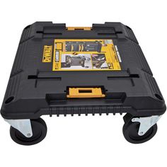 a black and yellow tool box sitting on top of a plastic dolly with two wheels