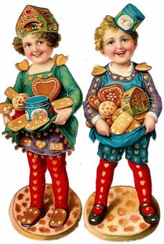 two figurines of children holding cookies and pretzels