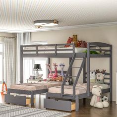 a bedroom with bunk beds and toys in it