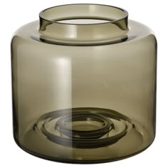 a brown glass jar with a black lid