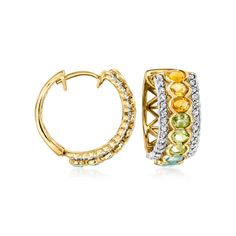 Ross-Simons - 3.40ct t. w. Multi-Gemstone, .60ct t. w. White Zircon Hoop Earrings Over Sterling. 3/4". Your favorite traditional hoop earrings just got a whole lot more colorful! 3.40 ct. tot. gem wt. peridot, sky blue topaz and citrine ovals adorn the classic duo, as .60 ct. t. w. white zircon rounds parade the pair in sparkling borders. Crafted in polished 18kt yellow gold over sterling silver with stylish crisscross openwork at the back. Hanging length is 3/4". Hinged post, white zircon and multi-gemstone hoop earrings. Peridot birthstones are the perfect gift for August birthdays. Topaz And Citrine, August Birthdays, Peridot Birthstone, Gemstone Hoop Earrings, Sky Blue Topaz, Blue Topaz, Citrine, Sky Blue, Topaz