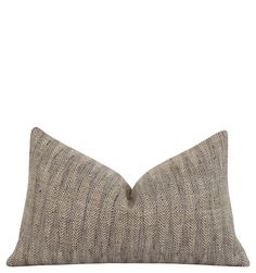 a gray and white pillow on a white background