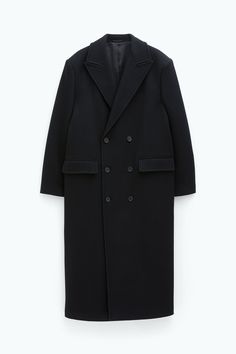 Classic Black Wool Coat With Double-breasted Buttons, Black Double-breasted Wool Coat With Concealed Placket, Black Wool Coat With Concealed Placket For Winter, Classic Black Oversized Wool Coat, Oversized Black Outerwear With Concealed Placket, Black Wool Coat For Work With Double Button Closure, Black Wool Coat With Double Button Closure For Work, Black Wool Coat With Double Button For Work, Oversized Double-breasted Wool Coat For Business