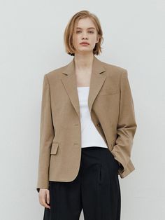 This is a feminine and modern jacket by WEARIS that is made out of high quality and sturdy material. With distinctive mood of the design and comfortable wear, you can style it for your comfortable daily outfit.- Relaxed semi oversized silhouette- Light and sturdy fabric with elasticity- Modern and minimal mood Oversized Khaki Blazer For Workwear, Oversized Beige Blazer For Office, Oversized Beige Blazer With Notch Lapel, Oversized Beige Blazer With Lapel Collar, Beige Single Breasted Outerwear With Relaxed Fit, Beige Relaxed Fit Single Breasted Outerwear, Beige Single Breasted Relaxed Fit Outerwear, Classic Outerwear With Relaxed Fit For Office, Classic Relaxed Fit Outerwear For Office