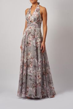 Please Note: Returns are accepted but ONLY for in-store or online credit * Mascara light grey floral maxi dress * MC165108 * Halterneck * Low back * Underbust pleating Very pretty flowing floral maxi dress from Mascara. MC165108 has a tie halterneck and a low back and the flowing skirt is super flattering for all shapes. LAST SIZE AND IN THE SALE Gray Formal Maxi Dress, Fitted Gray Floral Print Dress, Spring Gray A-line Maxi Dress, Gray Flowy Maxi Dress, Wedding Guest Dresses Uk, Grey Floral Dress, Floral Dress Formal, Guest Attire, London Dresses