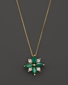 A charming flower pendant necklace with emeralds and diamonds in 14K yellow gold. Girlfriend Necklace Gift, Floating Diamond Necklace, Diamond Flower Pendant, Diamond Heart Pendant Necklace, Dainty Diamond Necklace, Diamond Solitaire Necklace, Dainty Gold Necklace, Flower Pendant Necklace, Exclusive Jewelry