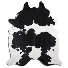 a black and white cowhide rug on a white background